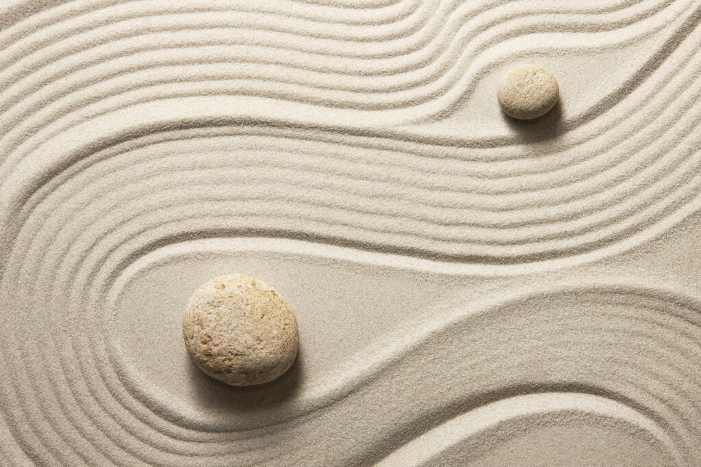 meditation stones in sand